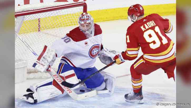 Backlund reaches career milestone in 5-2 win over Canadiens minus coach St. Louis