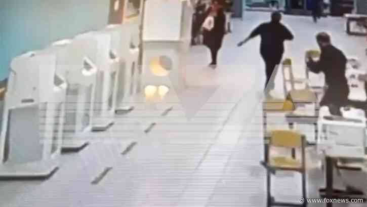 WATCH: Anti-Putin activists vandalize, set fire at voting stations in protest against election