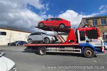Abandoned cars towed away on Bridge Street, Church