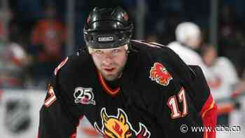 Former Calgary Flame Chris Simon dead at 52