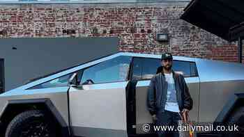 DJ Steve Aoki and rapper Big Sean latest celebrity to receive a new Cybertruck as average customers wait in the 'peasants corner' to hear about delivery dates