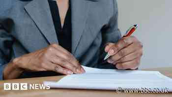 US holds interest rates steady but signals cuts ahead