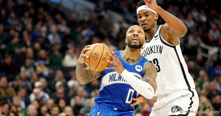 Lillard sparkles, Antetokounmpo returns to help Bucks hold off Nets