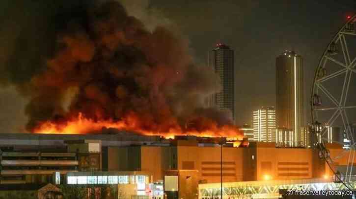 Gunmen in combat fatigues fire on Moscow concert hall crowds, killing and wounding several people