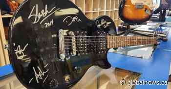 Guitar with Guns N’ Roses autographs to be auctioned off by Sherwood Park Goodwill