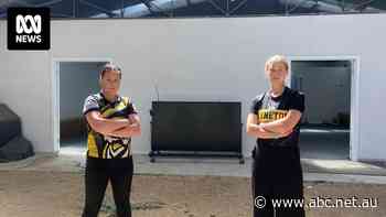 Getting changed in a filthy old sheep shed — the bleak reality for country netball players