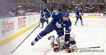 McMann, Holmberg lead Leafs over Oilers