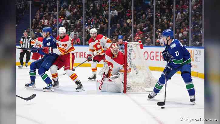 Hoglander scores twice as Vancouver Canucks double up Calgary Flames 4-2