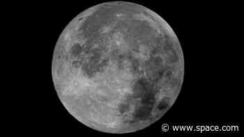 March's Full Worm Moon wriggles its way through a subtle lunar eclipse in stunning photos