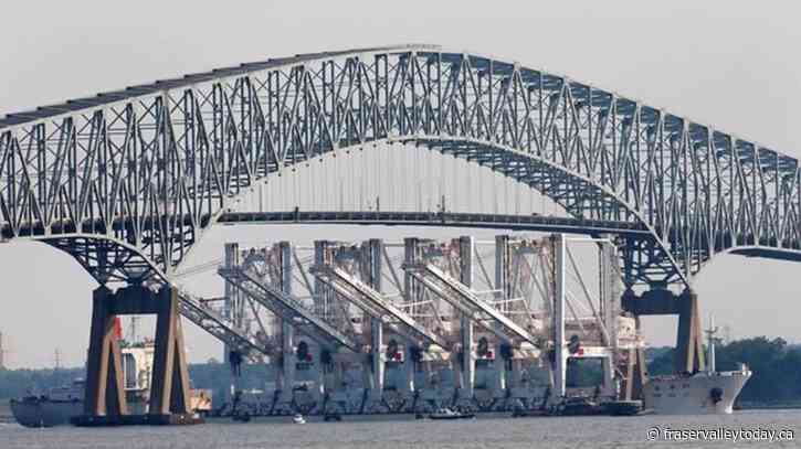 Francis Scott Key Bridge in Baltimore collapses after ship struck it, sending vehicles into water