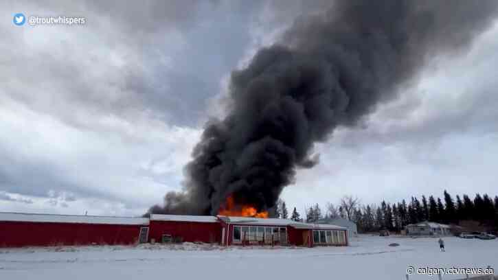 Thick black smoke seen billowing from Springbank barn fire