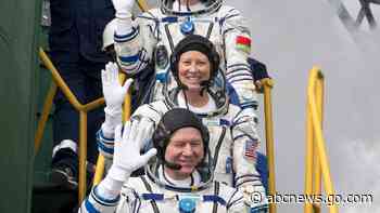 Russian Soyuz spacecraft with 3 astronauts docks at the International Space Station