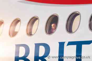 BA billboards flip the camera to show staff and passengers looking out of aircraft windows