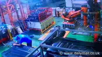 Robot crushes factory worker to death: Victim is pinned to bench and killed in Thailand