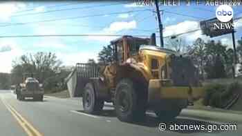 WATCH:  Police say an ex-employee led police on a slow-speed chase of a stolen front-loader