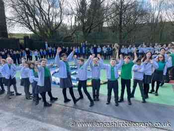 Hawkshaw: Cheers on school playground for cereal box 'domino rally'