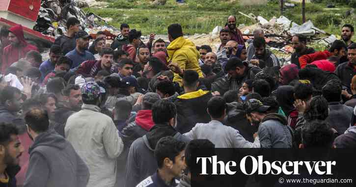 ‘Death at any moment’: fights break out as Gazans compete over airdropped aid