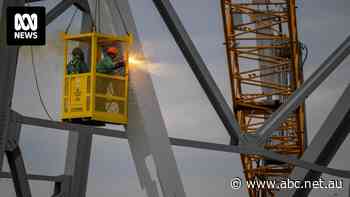 Crews clear first pieces of Baltimore bridge as ship remains motionless