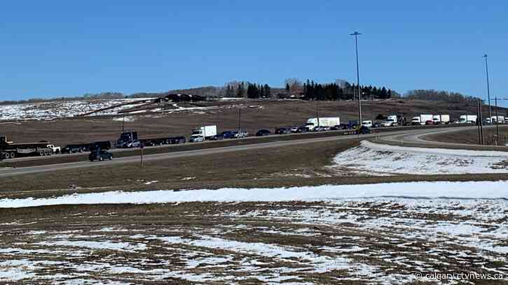 Carbon tax protesters rally on highway west of Calgary