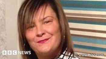 Murder charge after mother found dead at home