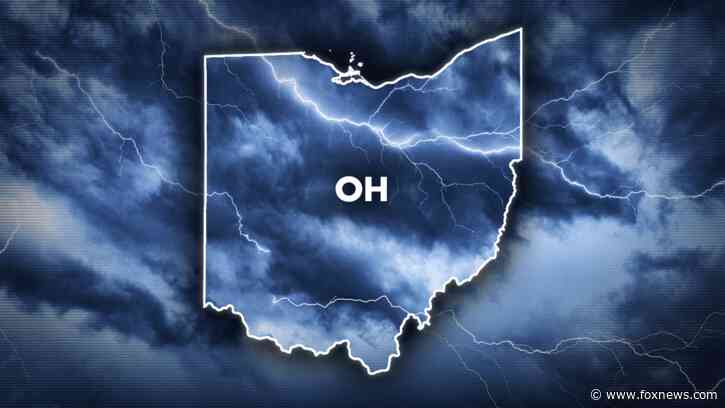 Firefighters rescue 2 people trapped under Ohio bridge by fast-rising river waters