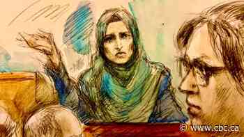 Wife of man accused in Toronto cop death testifies she thought plainclothes officers' badge was fake