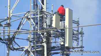 WATCH LIVE: ‘I'm not done working yet': Man climbs cell tower in Miami, shuts down power and refuses to come down