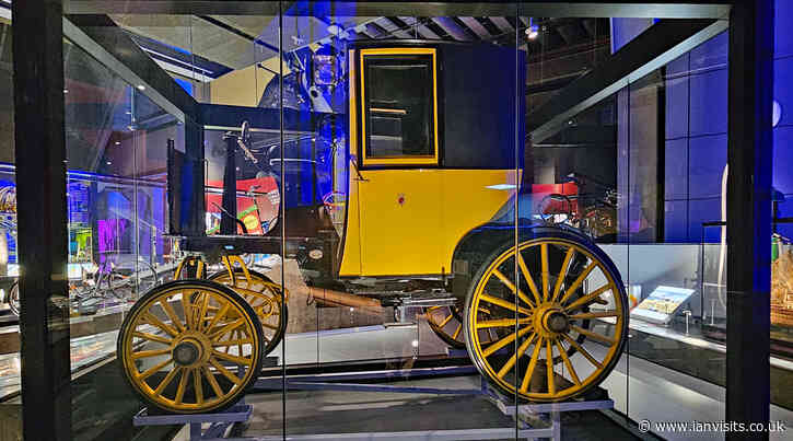 A 120 year old electric carriage goes on display at the Science Museum
