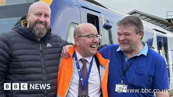 Platform guard of honour for retiring train driver
