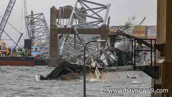 Biden touring collapsed Baltimore bridge where recovery effort has political overtones