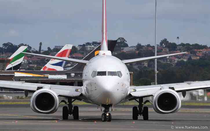 'Drunk' airplane passenger fined for reportedly urinating in cup during delay at Australia airport