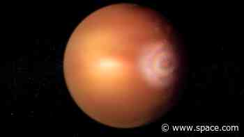 This hellish exoplanet's skies rain iron and create a rainbow-like effect