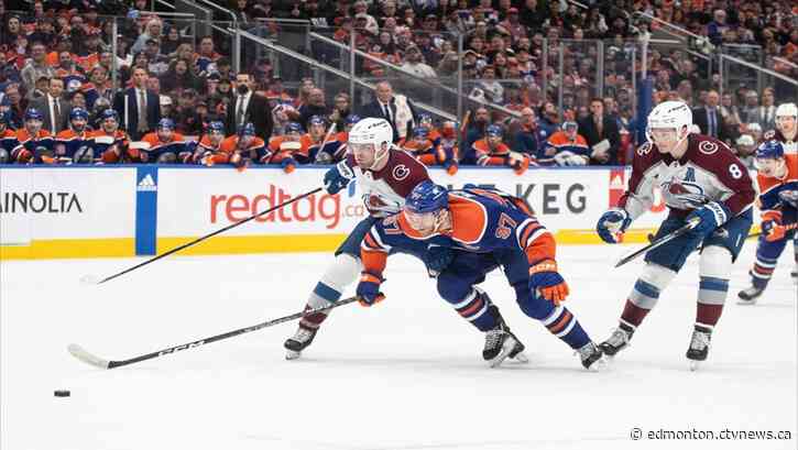 McDavid scores twice as Oilers top Avalanche 6-2 to clinch playoff berth