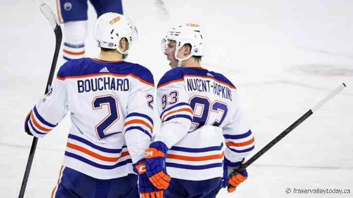 Oilers keep rolling with 4-2 victory over reeling Flames