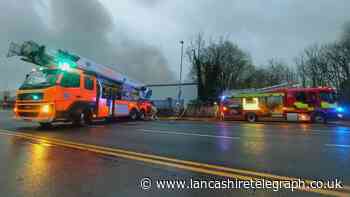 Fire crews tackle blaze at business estate in Blackburn