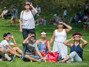 Montreal eclipse updates: Clear skies make it a perfect day for skywatching