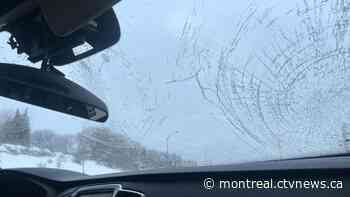 Couple lucky to be alive after piece of Montreal highway crashes into their windshield