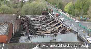 Drone footage shows devastation of fire at Blackburn factory