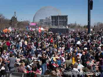 Montreal eclipse updates: Thousands gather to watch as the moon begins to cover the sun