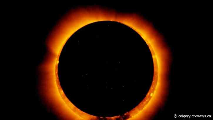 Eclipse watchers meet at Calgary science centre for the big event