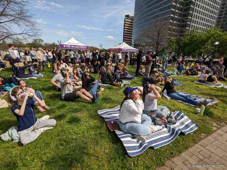 Photos: Crowds witness the solar eclipse in Arlington