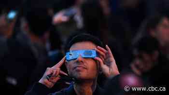 Eclipse passes over Toronto Monday afternoon