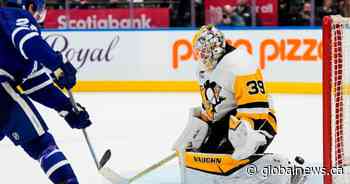 Matthews scores No. 65, Leafs down Pens in OT