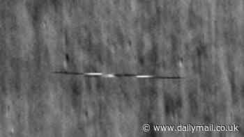 Surf board-shaped UFO filmed speeding around the moon by NASA's lunar orbiter