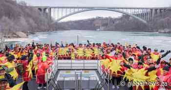 A bunch of people dressed up as the sun in Niagara Falls and broke a Guinness record