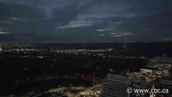 A drone's-eye, timelapse view of the eclipse over Hamilton's McMaster University