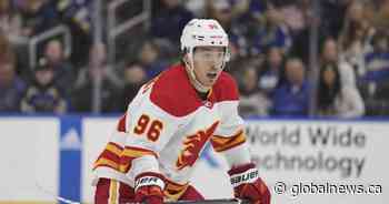 Kuzmenko scores in OT to lift Flames to 3-2 win over Sharks