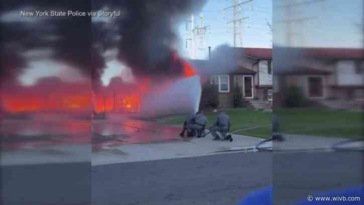 Troopers commended for jumping in to battle Lockport house fire