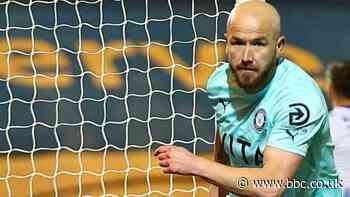 Stockport win to go within one point of promotion