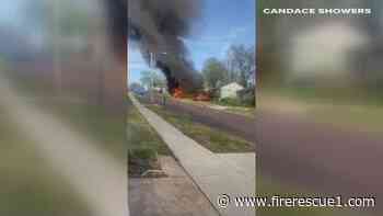 Driverless, burning school bus crashes into Mo. house